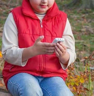 Mobile Apps - Child with Smartphone